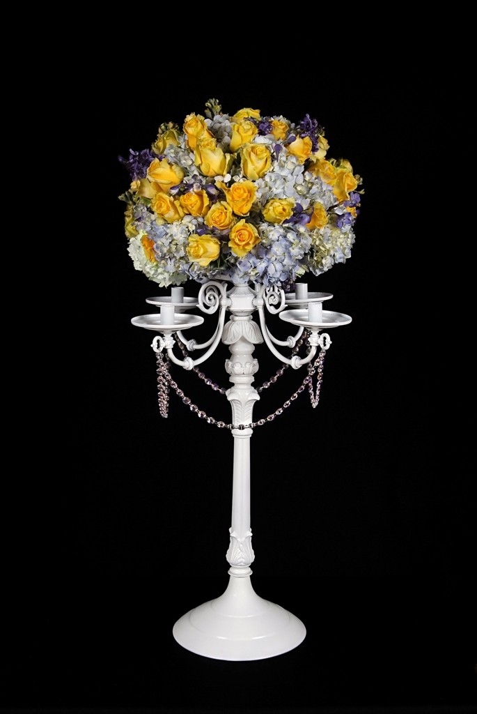 WC100 A traditional style candelabra in white. 30